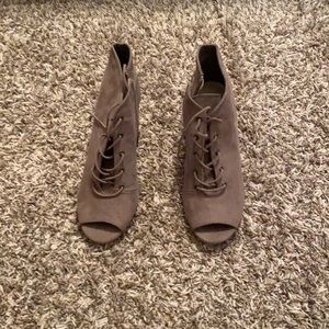 Bamboo peep toe lace up booties.